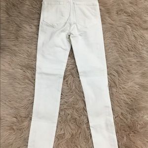 White Jeans with black/red strip down the side